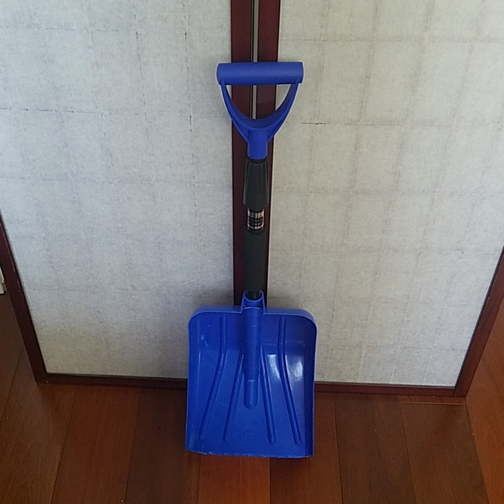 Blue and black adjustable snow shovel